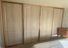 Examples of sliding wardrobes doors with more traditional designs in.