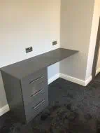 Built-in dust grey dresser with soft close drawers