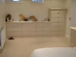 Wall to wall fitted drawers with out wasting any space