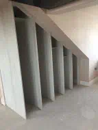 Sloped wardrobes before the hinged doors are fitted - installed in Yarm