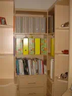 Bookshelf with drawers fitted into an alcove