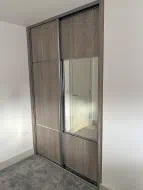 2 door Bardilino split panel doors with one been all wood and the other having mirror in the middle, fitted in Hartlepool